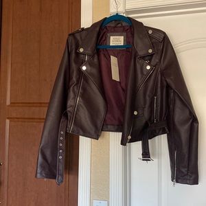 Ashley outer wear faux leather jacket . Color is eggplant .